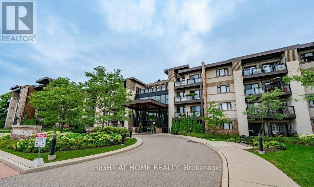 419 - 128 Garden Drive, Oakville, Ontario  L6K 2W5 - Photo 2 - W12583728