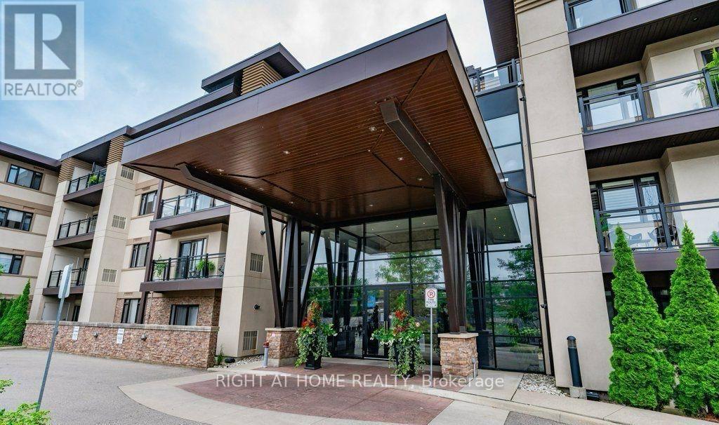 419 - 128 Garden Drive, Oakville, Ontario  L6K 2W5 - Photo 3 - W12583728