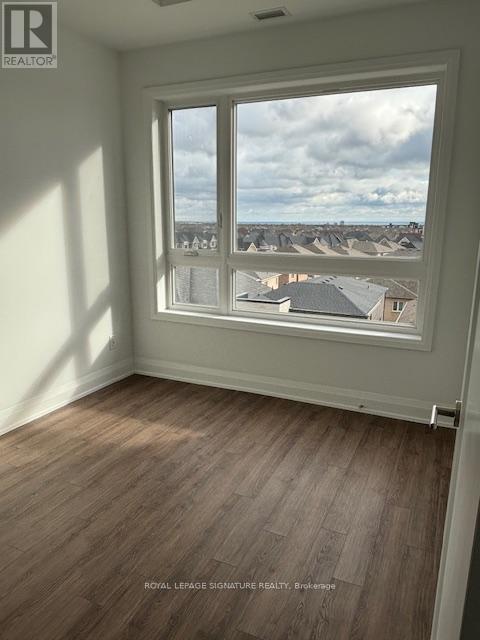 533 - 3250 Carding Mill Trail, Oakville, Ontario L6M 0Z3 - Photo 12 - W12581086