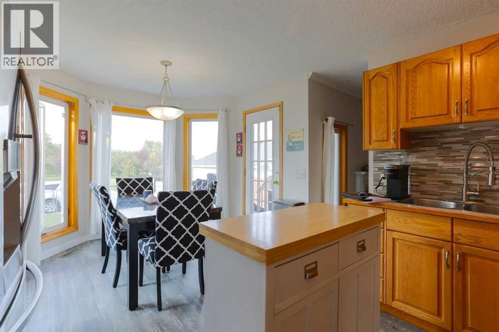 1118 Maple Avenue, Crossfield, Alberta  T0M 0S0 - Photo 6 - A2256547