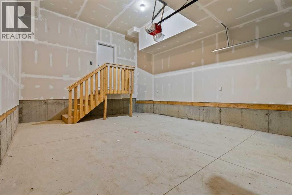 90 Heritage Circle, Cochrane, Alberta  T4C 3G9 - Photo 41 - A2267772