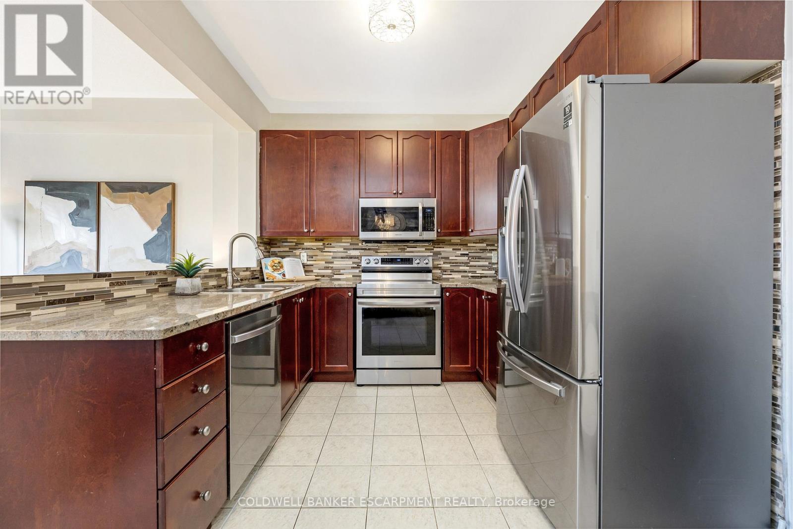 602 Yates Drive, Milton, Ontario  L9T 7R1 - Photo 8 - W12584014