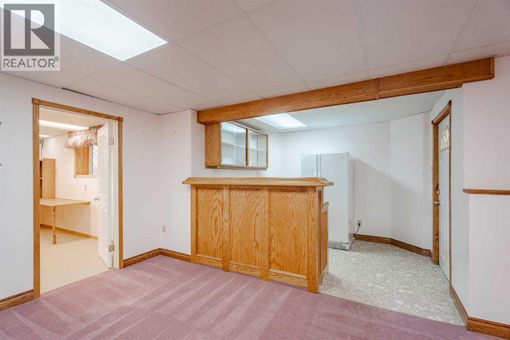 301 Riverview Green, Cochrane, Alberta  T4C 1K5 - Photo 34 - A2267736