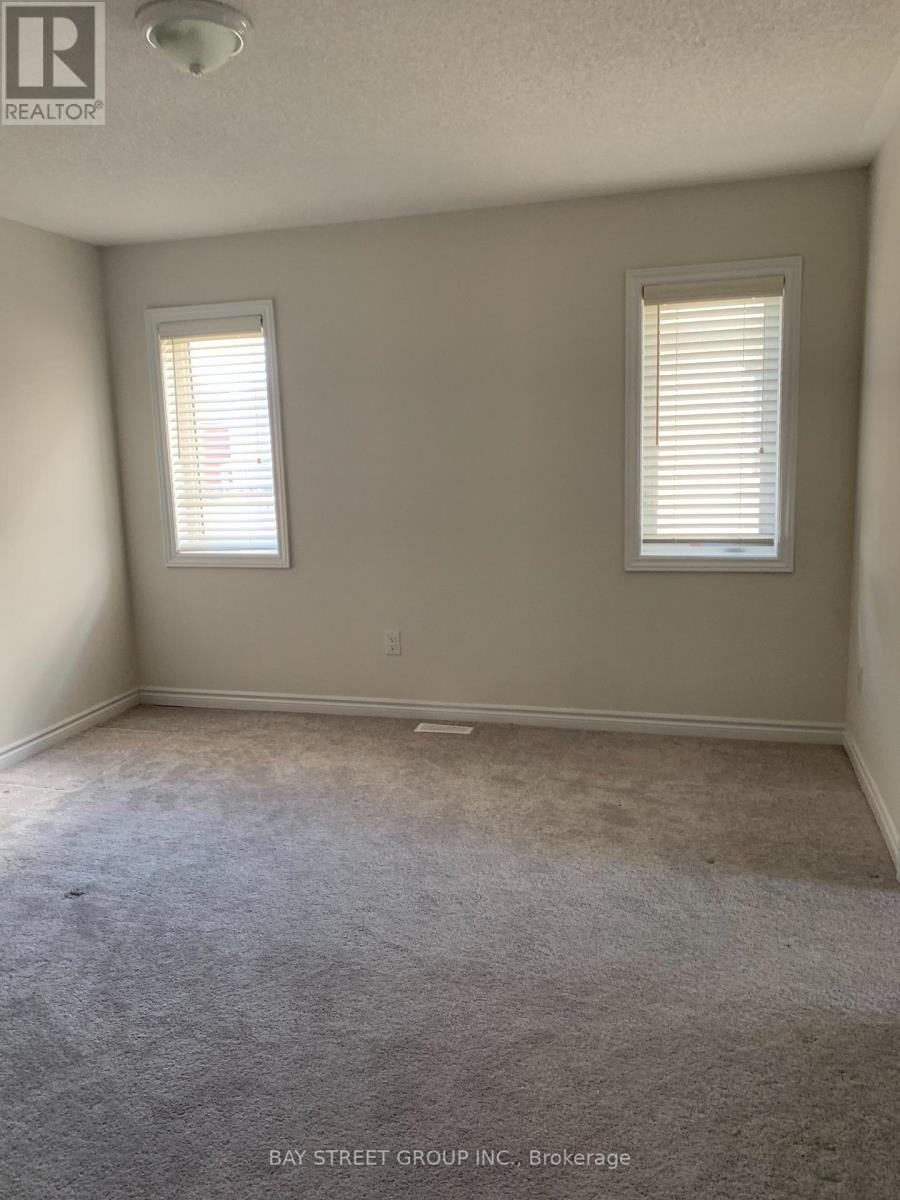 97 Redmond Crescent, Springwater, Ontario  L9X 1Z8 - Photo 3 - S12584248