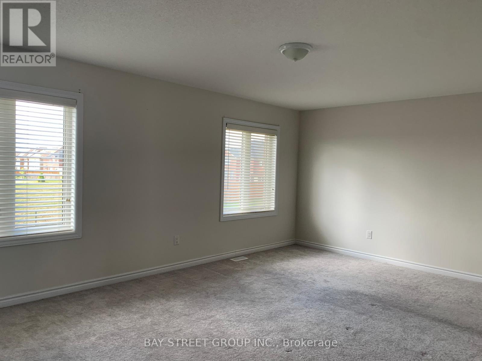 97 Redmond Crescent, Springwater, Ontario  L9X 1Z8 - Photo 4 - S12584248