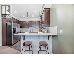 105, 1005A Westmount Drive, Strathmore, Alberta