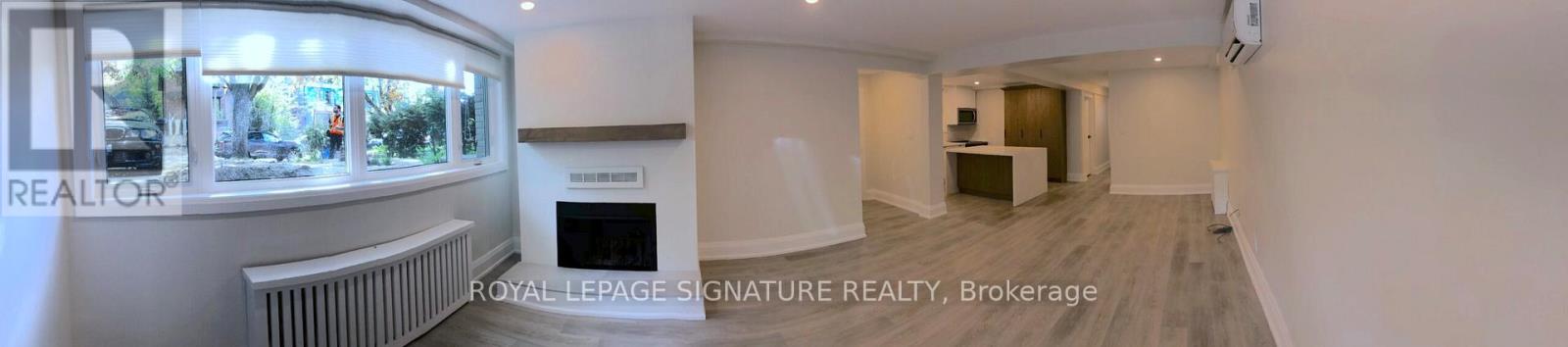 1 - 218 Wheeler Avenue, Toronto, Ontario M4L 1V5 - Photo 2 - E12584694