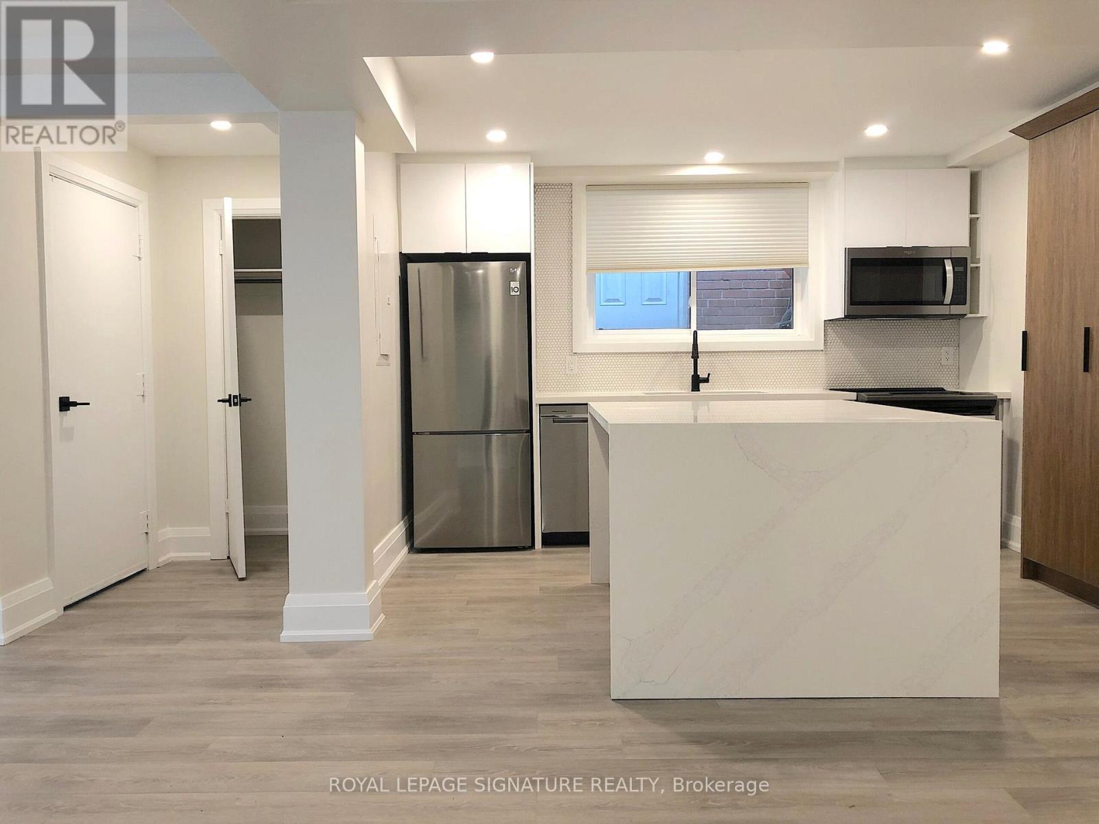 1 - 218 Wheeler Avenue, Toronto, Ontario M4L 1V5 - Photo 4 - E12584694