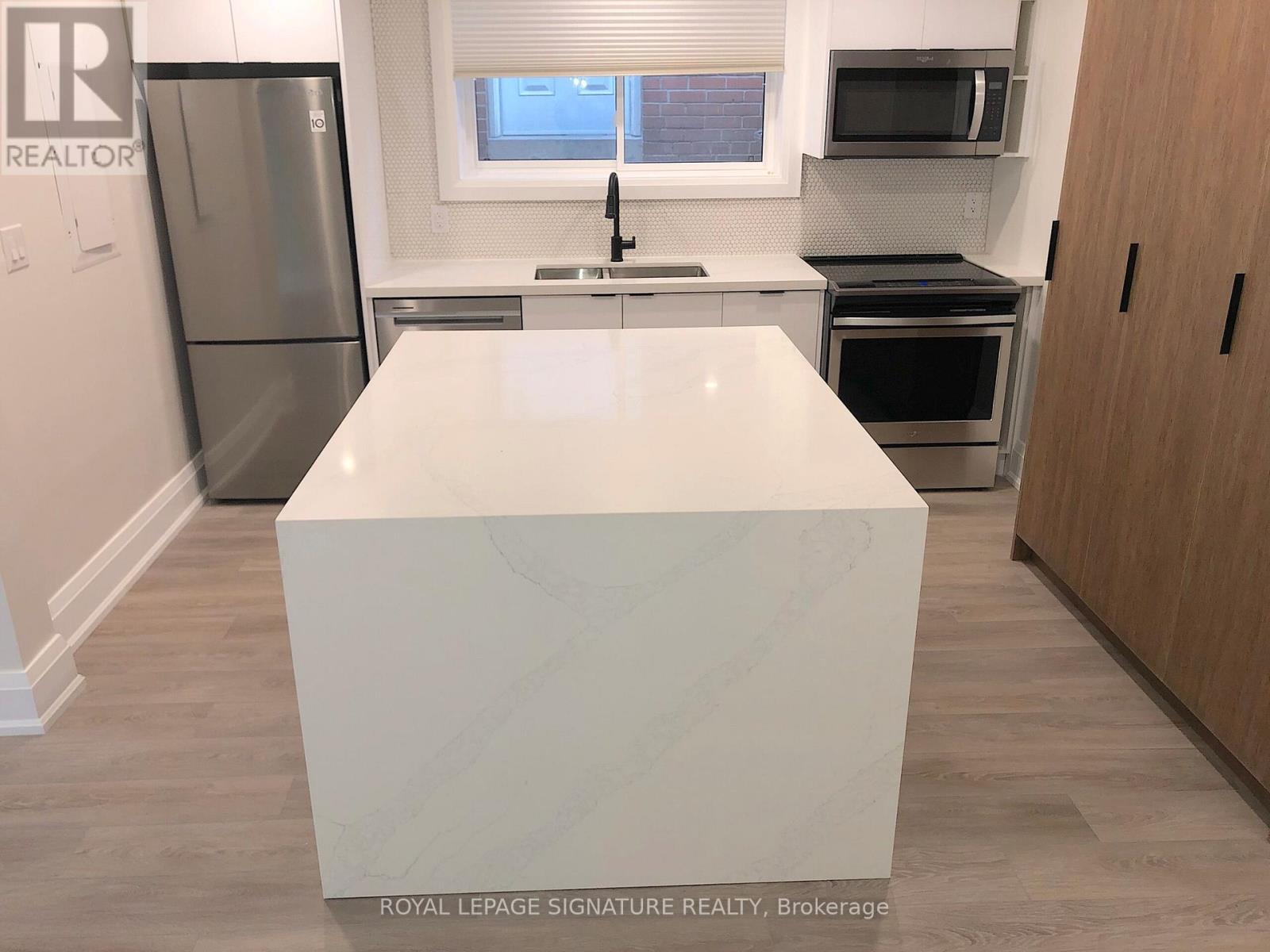 1 - 218 Wheeler Avenue, Toronto, Ontario M4L 1V5 - Photo 5 - E12584694