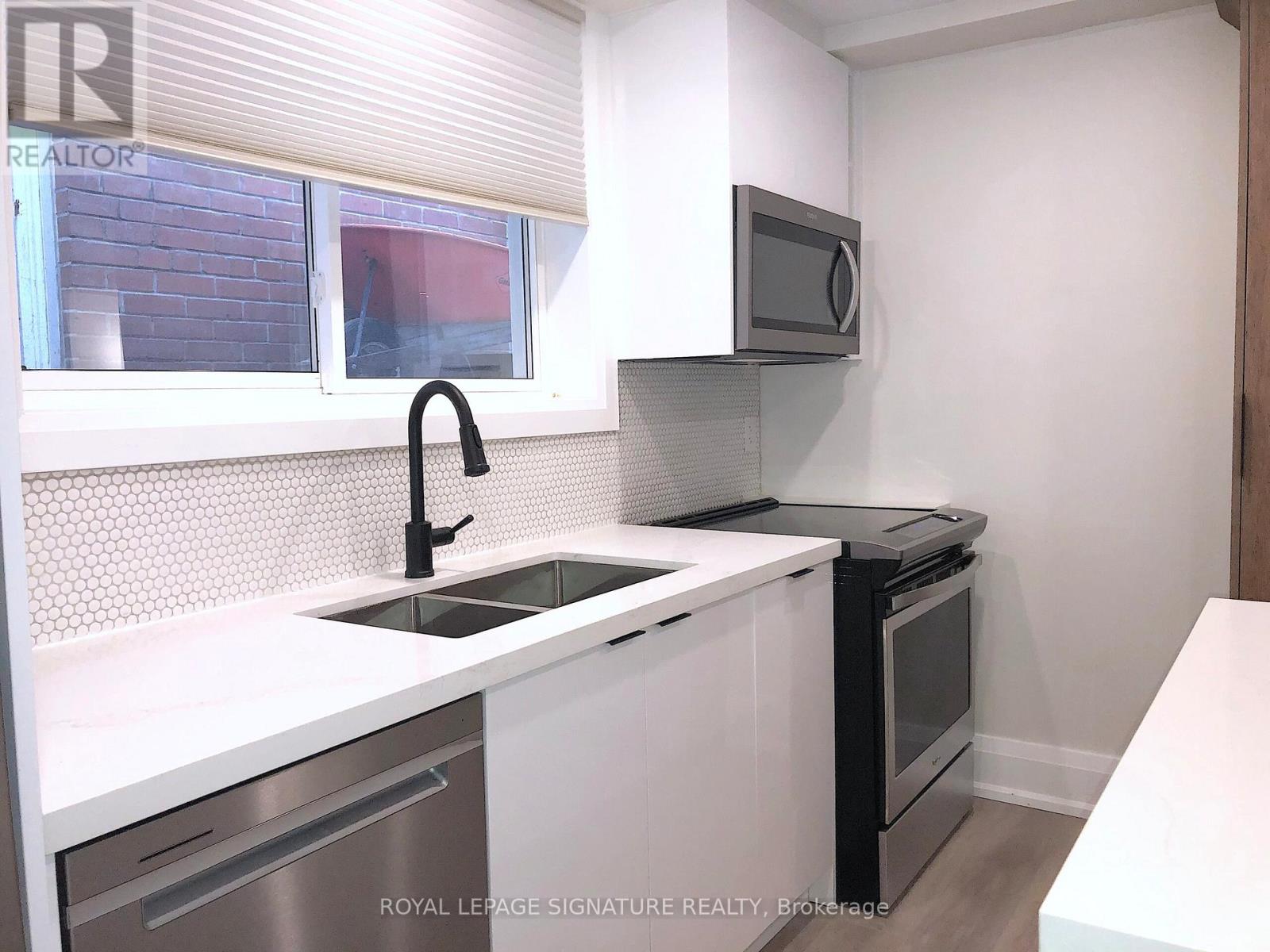 1 - 218 Wheeler Avenue, Toronto, Ontario M4L 1V5 - Photo 6 - E12584694