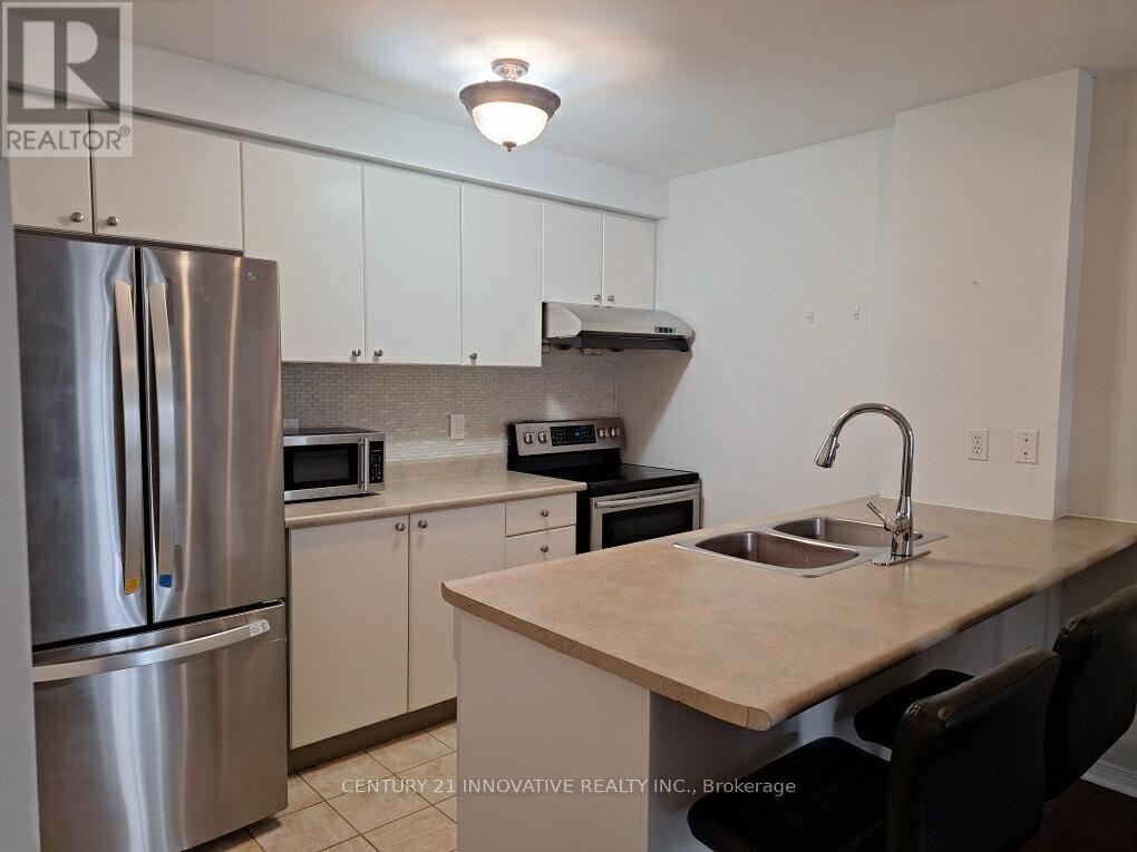 304 - 91 Aspen Springs Drive, Clarington, Ontario  L1C 5J9 - Photo 5 - E12559416