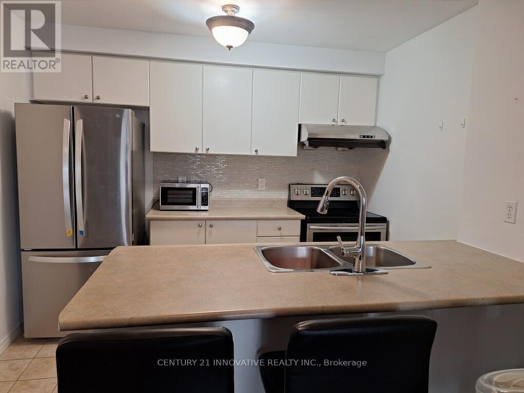 304 - 91 Aspen Springs Drive, Clarington, Ontario  L1C 5J9 - Photo 4 - E12559416