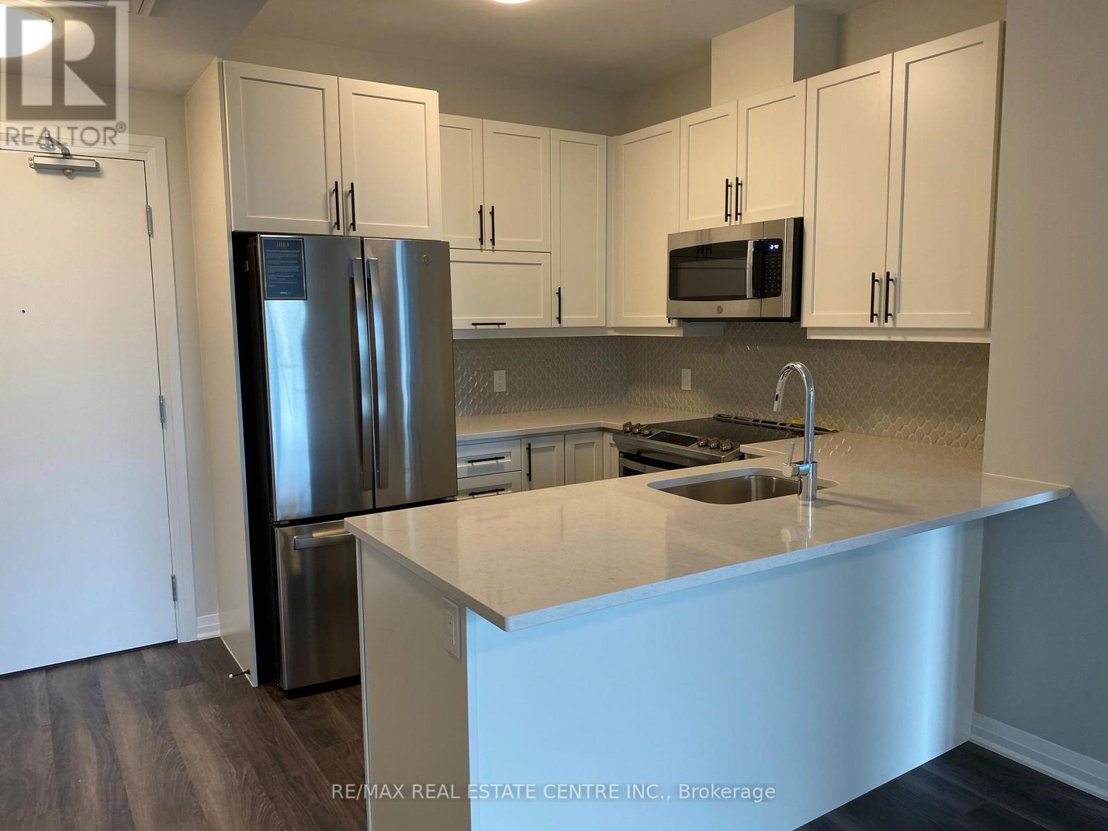 228 - 95 Dundas Street W, Oakville, Ontario  L6M 5N3 - Photo 5 - W12584972