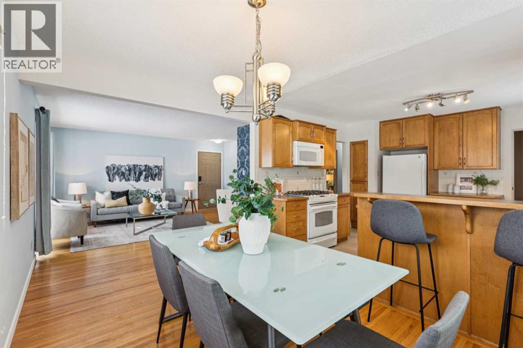 114 Hallbrook Drive Sw, Calgary, Alberta  T2V 3H6 - Photo 8 - A2273074