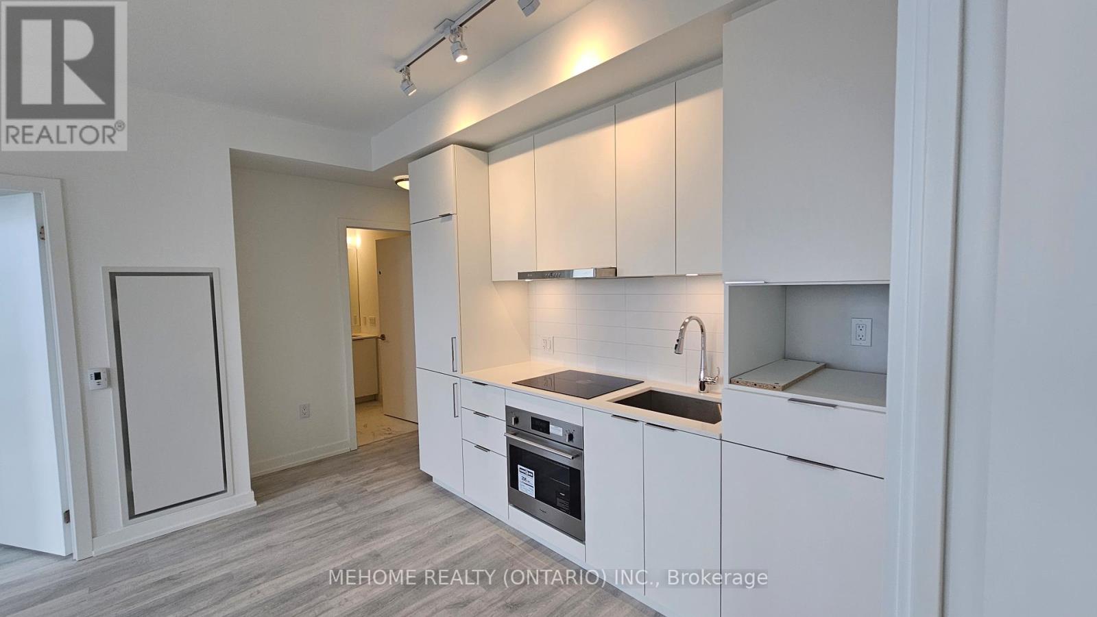 N1310 - 7 Golden Lion Heights, Toronto, Ontario  M2M 3T9 - Photo 4 - C12431035