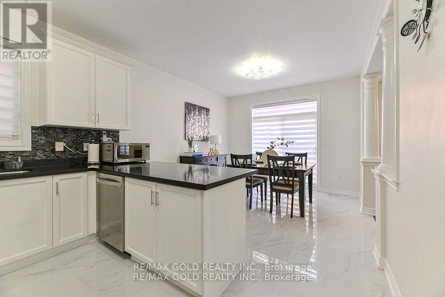 9 Natronia Trail, Brampton, Ontario  L6P 3N1 - Photo 12 - W12422555