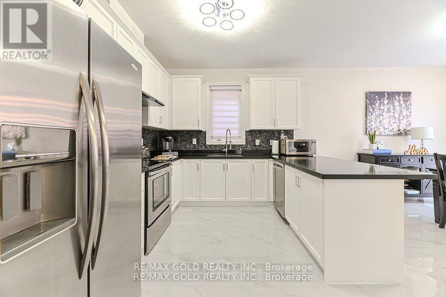 9 Natronia Trail, Brampton, Ontario  L6P 3N1 - Photo 10 - W12422555