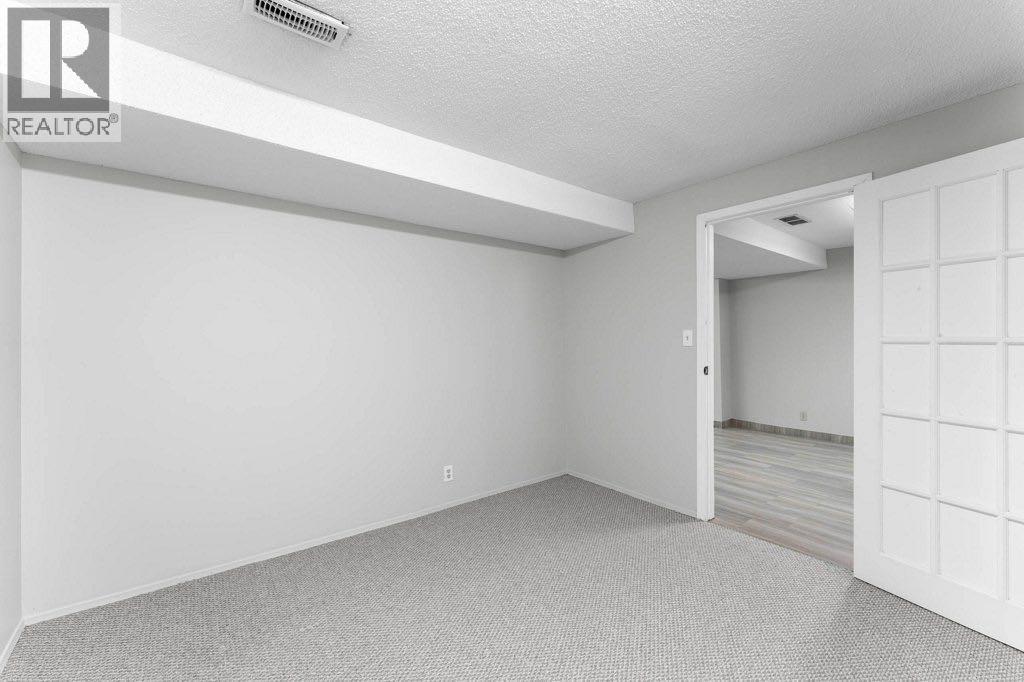 47 Woodmont Way Sw, Calgary, Alberta  T2W 4L7 - Photo 34 - A2271714