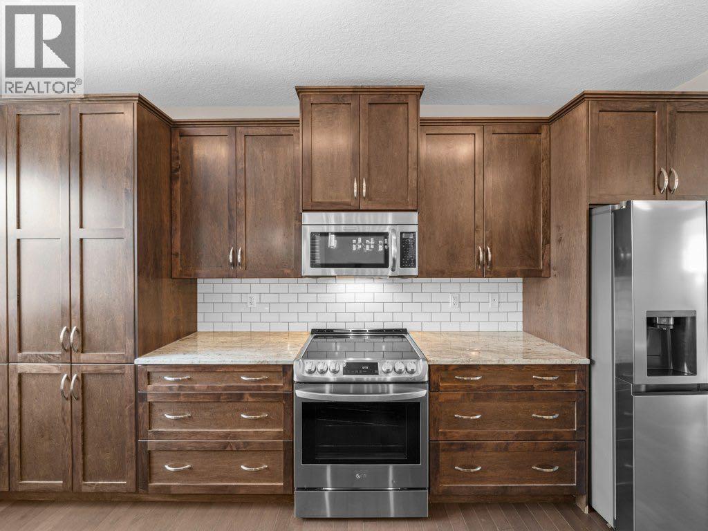 1023 Evanston Drive Nw, Calgary, Alberta  T3P 0K4 - Photo 5 - A2270907