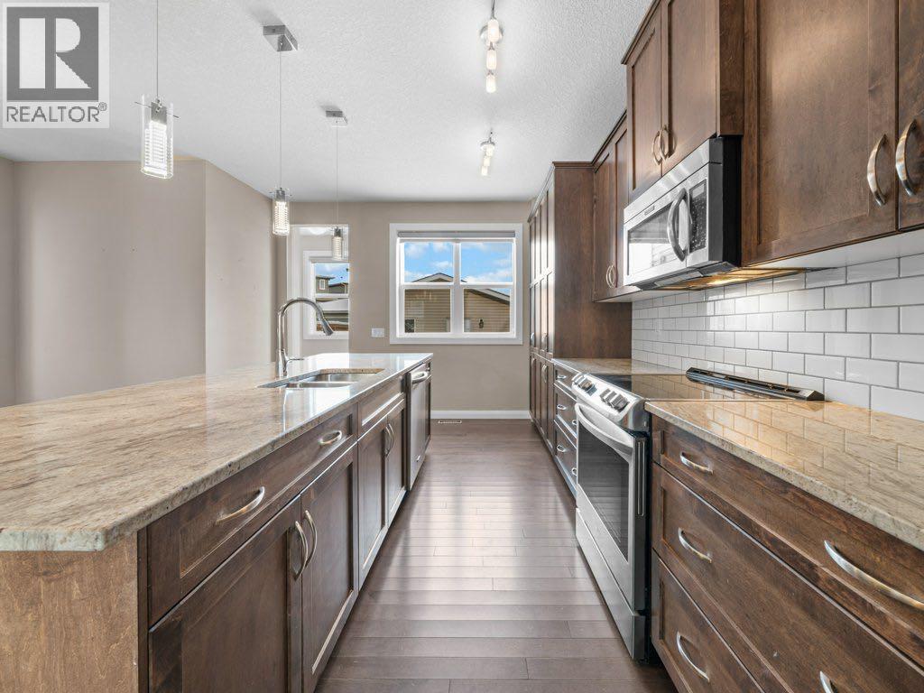 1023 Evanston Drive Nw, Calgary, Alberta  T3P 0K4 - Photo 6 - A2270907