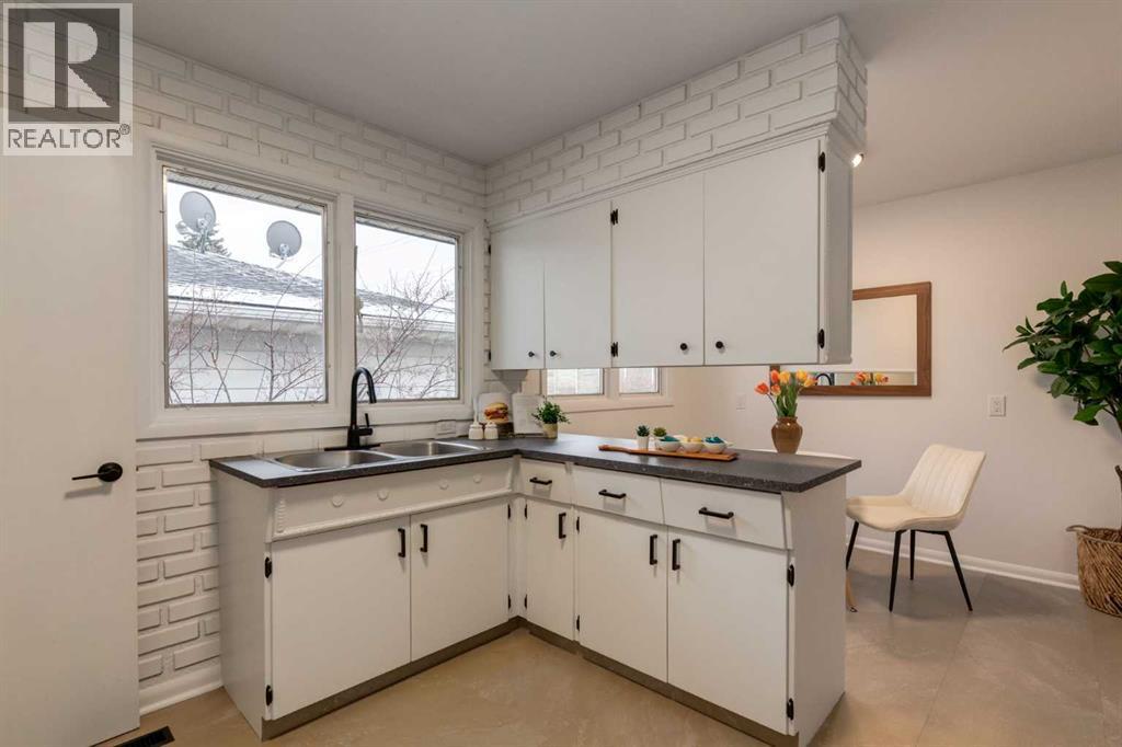 126 & 128 Winston Drive Sw, Calgary, Alberta  T3C 2P9 - Photo 25 - A2272841