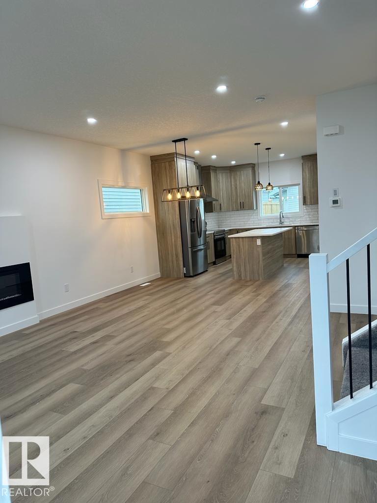 6079 180 Av Nw, Edmonton, Alberta  T5Y 3X1 - Photo 3 - E4466973