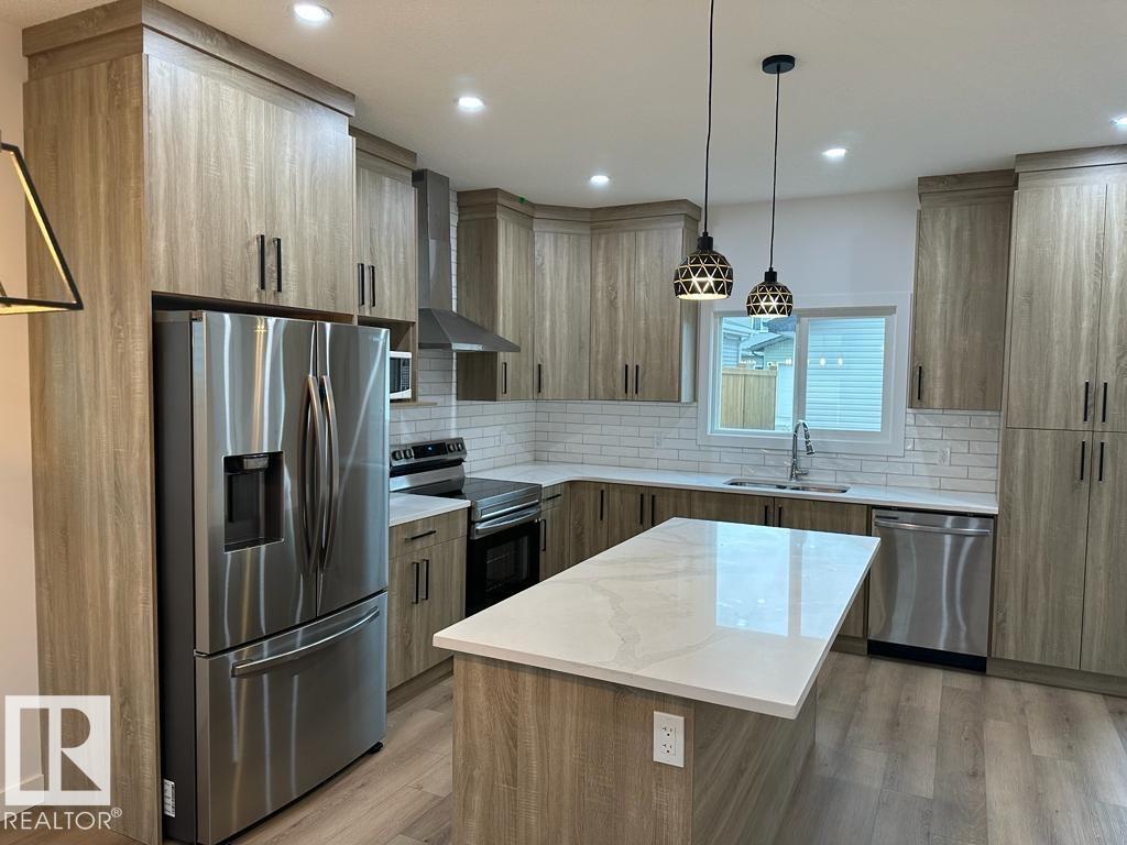 6079 180 Av Nw, Edmonton, Alberta  T5Y 3X1 - Photo 4 - E4466973