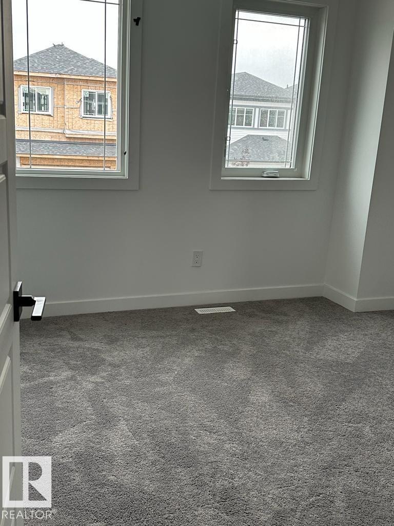 6079 180 Av Nw, Edmonton, Alberta  T5Y 3X1 - Photo 7 - E4466973