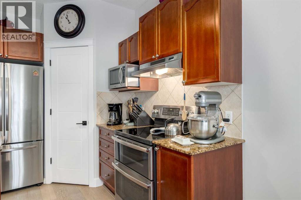 163 Cougarstone Court Sw, Calgary, Alberta  T3H 5R4 - Photo 11 - A2273136