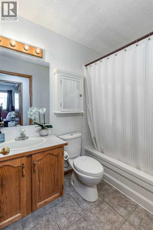 21 West Mcdougal Road, Cochrane, Alberta  T4C 1L3 - Photo 21 - A2256453