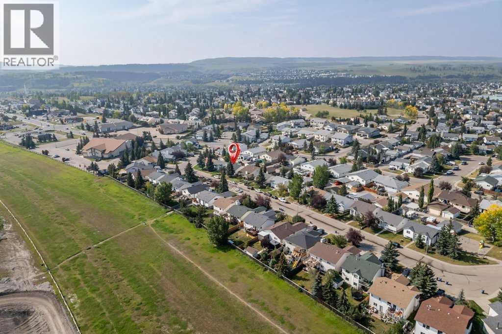 21 West Mcdougal Road, Cochrane, Alberta  T4C 1L3 - Photo 35 - A2256453