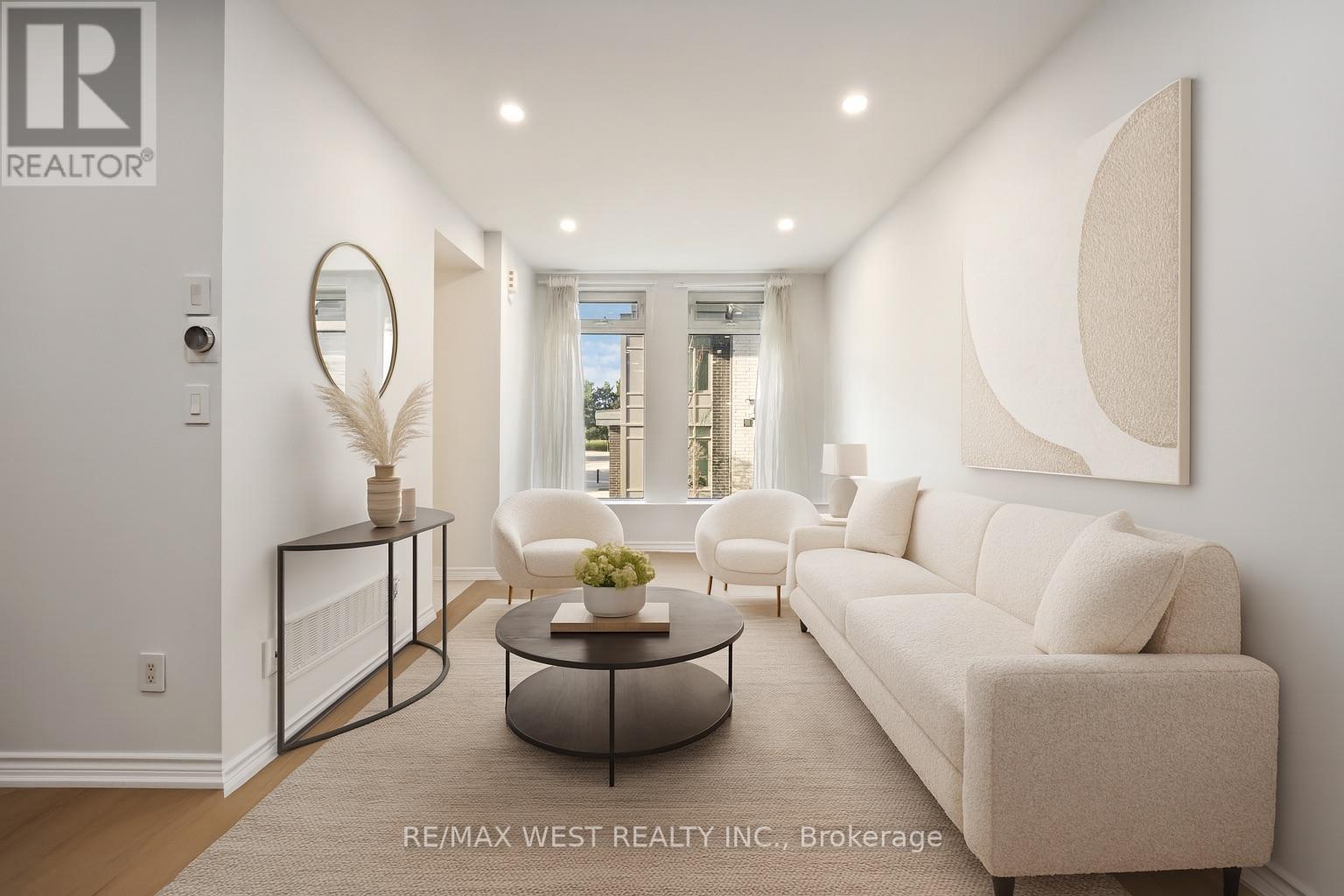 120 - 11 Applewood Lane, Toronto, Ontario  M9C 0C1 - Photo 2 - W12586114