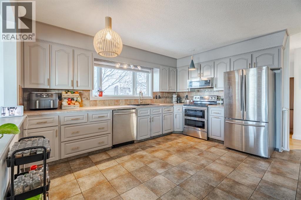 84 Thornaby Crescent Nw, Calgary, Alberta  T2K 5K6 - Photo 10 - A2272941