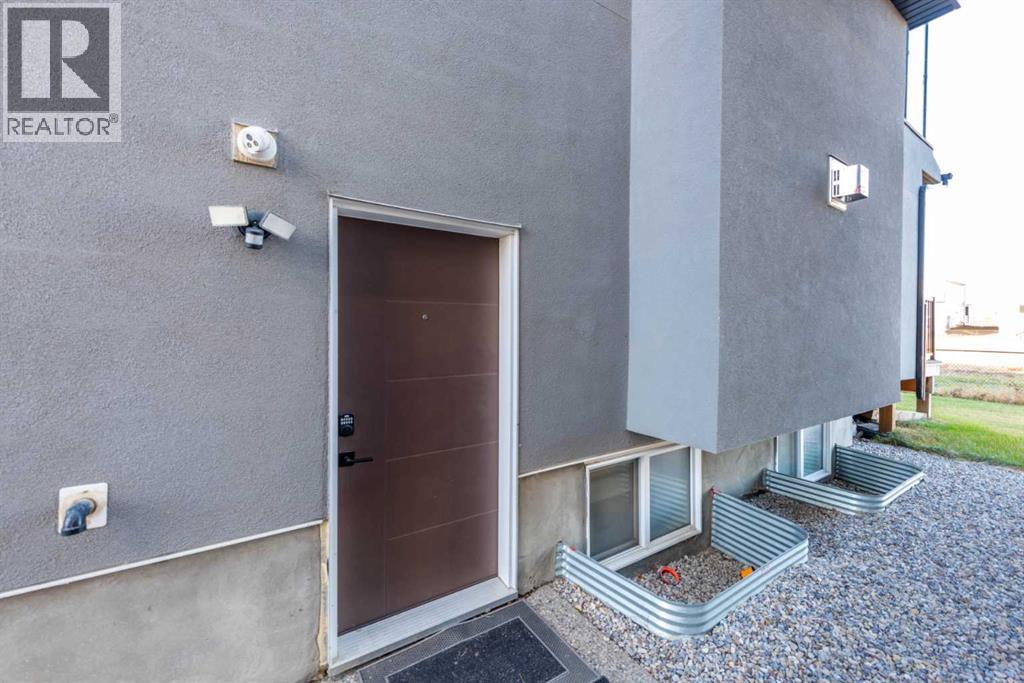 66 Waterford Road, Chestermere, Alberta T1X 2M7 - Photo 39 - A2271205