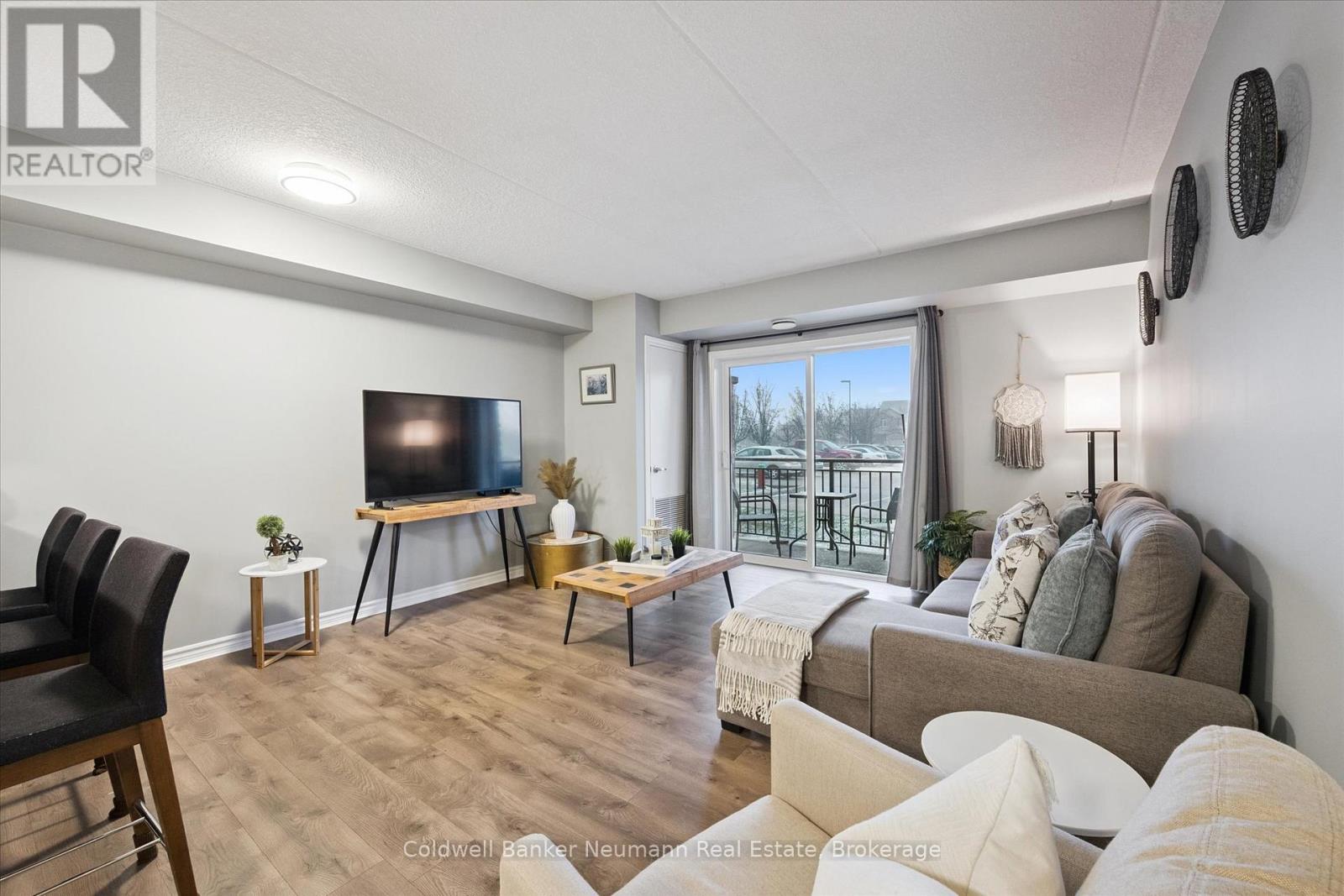 109 - 19 Waterford Drive, Guelph, Ontario  N1L 0G8 - Photo 2 - X12586490