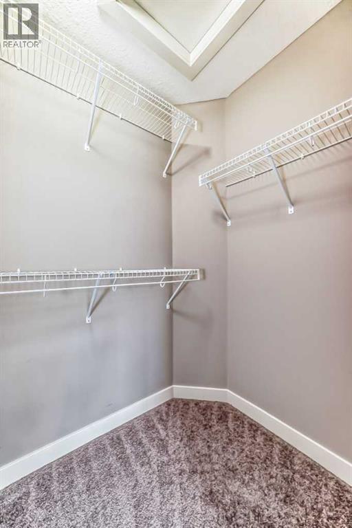 704 Evanston Manor Nw, Calgary, Alberta  T3P 0R9 - Photo 28 - A2271465