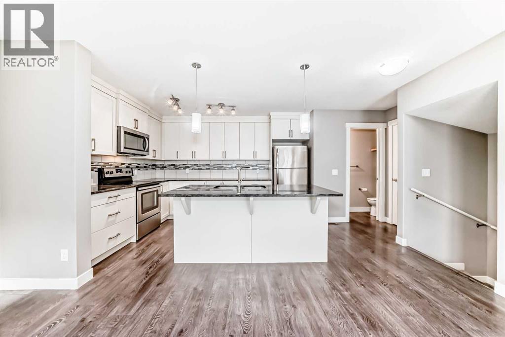 704 Evanston Manor Nw, Calgary, Alberta  T3P 0R9 - Photo 7 - A2271465