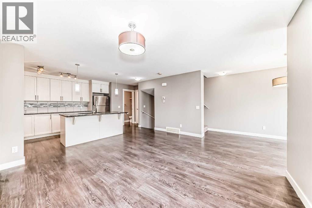 704 Evanston Manor Nw, Calgary, Alberta  T3P 0R9 - Photo 12 - A2271465