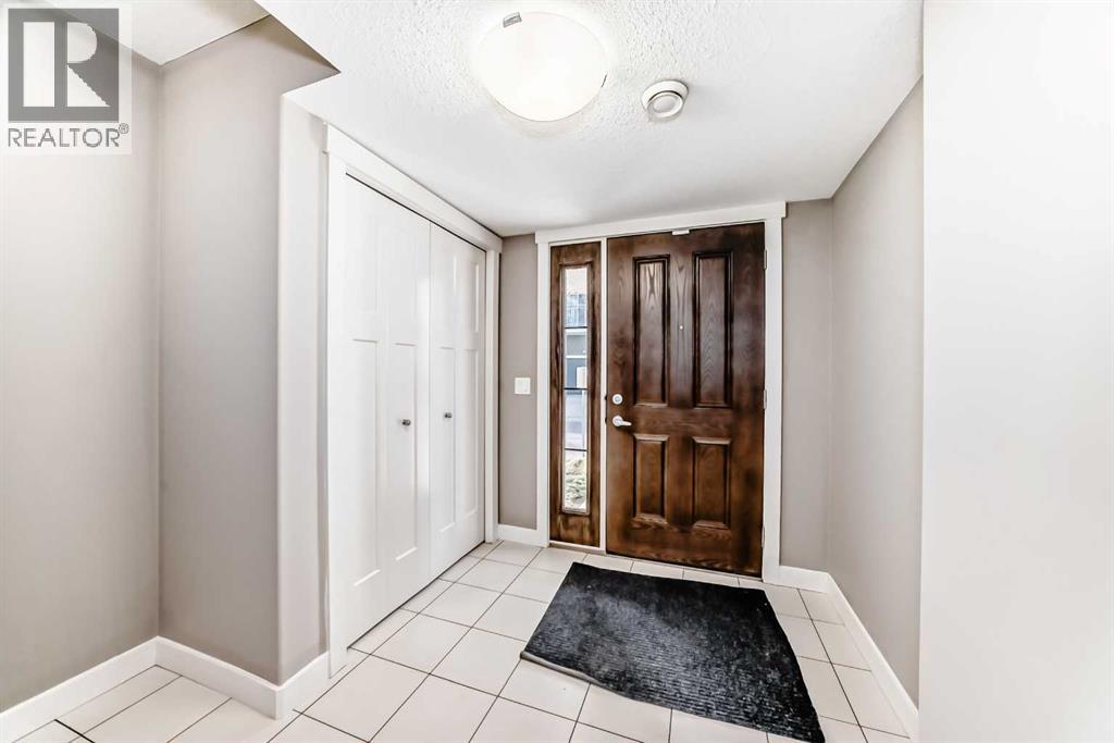 704 Evanston Manor Nw, Calgary, Alberta  T3P 0R9 - Photo 4 - A2271465