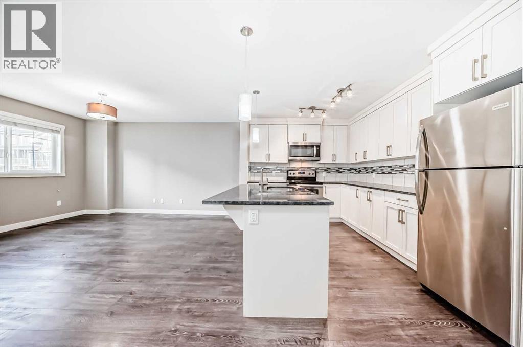 704 Evanston Manor Nw, Calgary, Alberta  T3P 0R9 - Photo 11 - A2271465