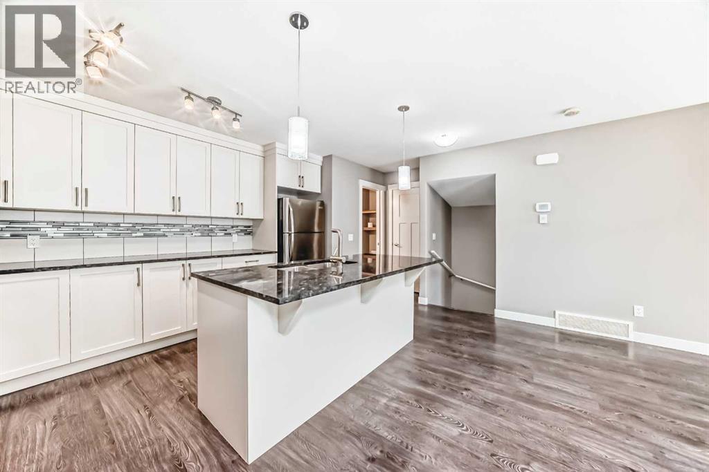 704 Evanston Manor Nw, Calgary, Alberta  T3P 0R9 - Photo 8 - A2271465