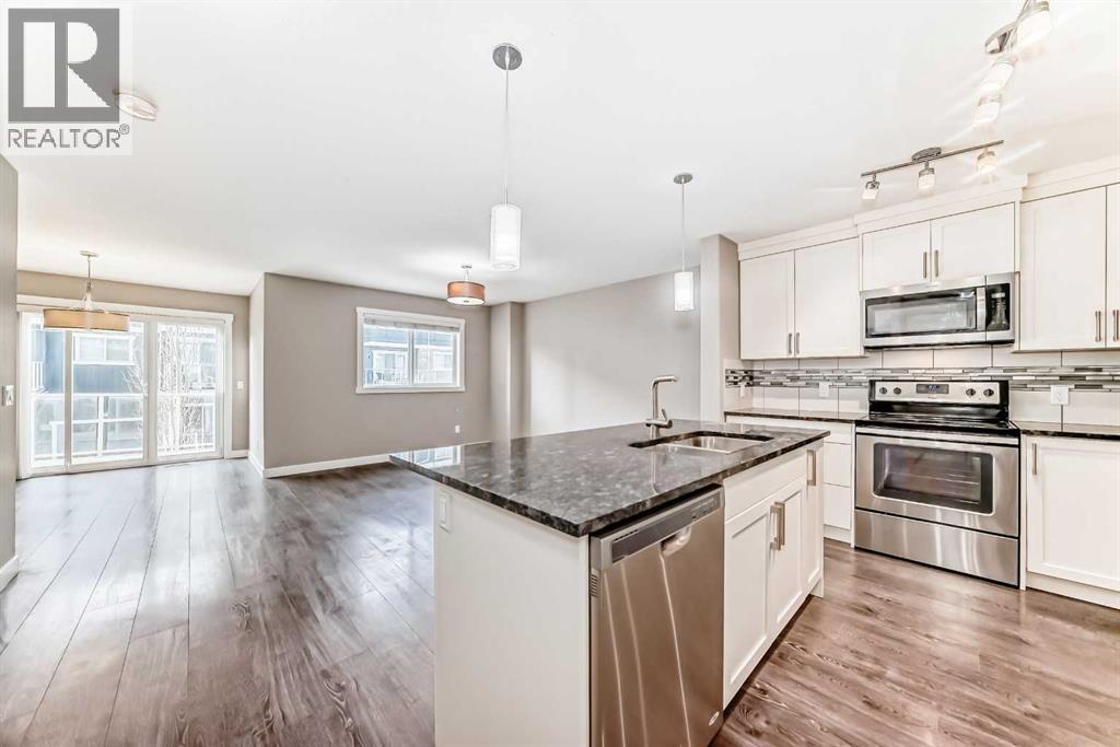 704 Evanston Manor Nw, Calgary, Alberta  T3P 0R9 - Photo 10 - A2271465