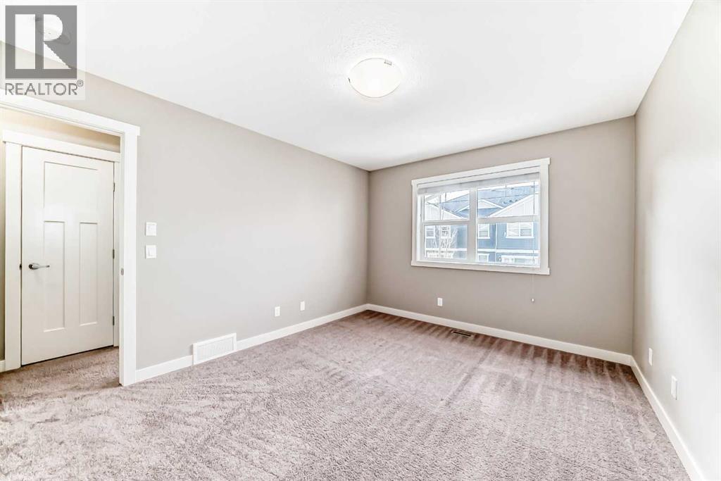 704 Evanston Manor Nw, Calgary, Alberta  T3P 0R9 - Photo 24 - A2271465