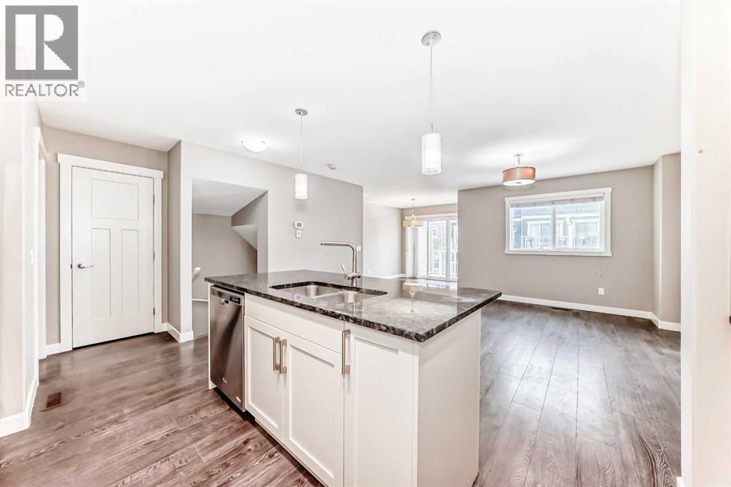 704 Evanston Manor Nw, Calgary, Alberta  T3P 0R9 - Photo 9 - A2271465