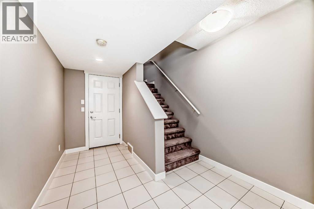 704 Evanston Manor Nw, Calgary, Alberta  T3P 0R9 - Photo 5 - A2271465