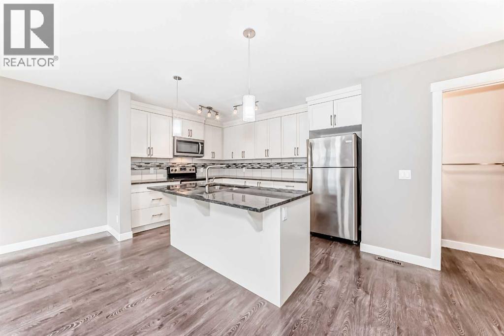 704 Evanston Manor Nw, Calgary, Alberta  T3P 0R9 - Photo 6 - A2271465