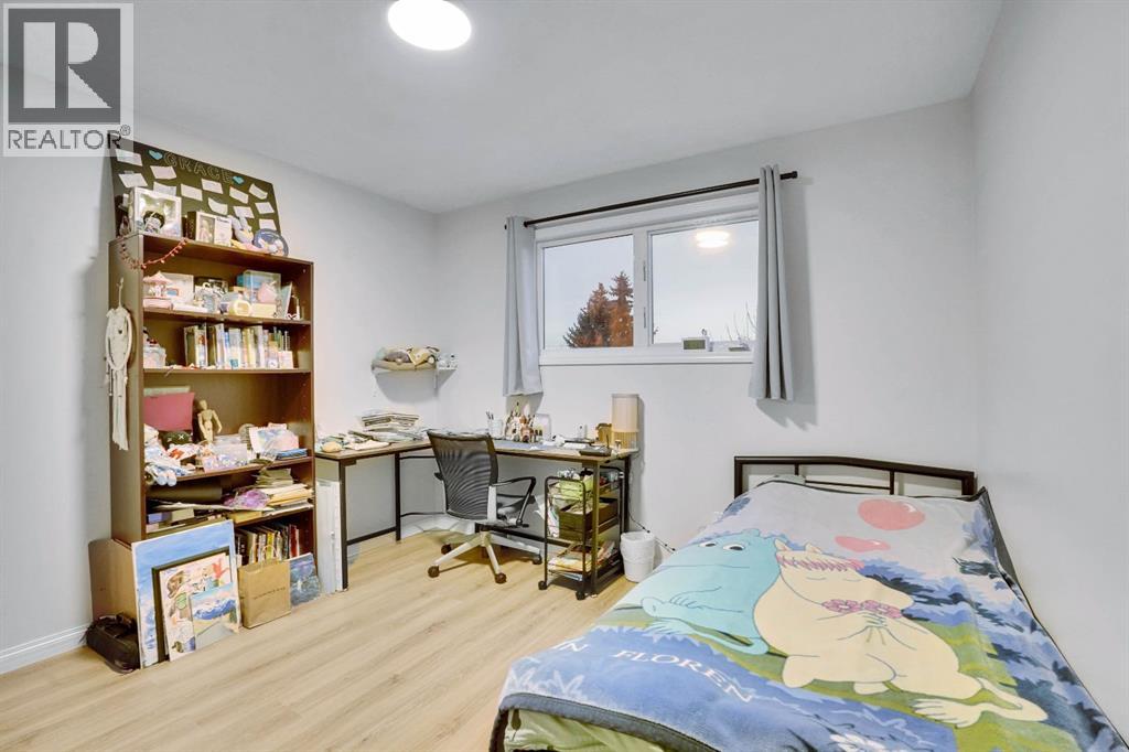 1038 Berkley Drive Nw, Calgary, Alberta  T3K 1A3 - Photo 23 - A2269891