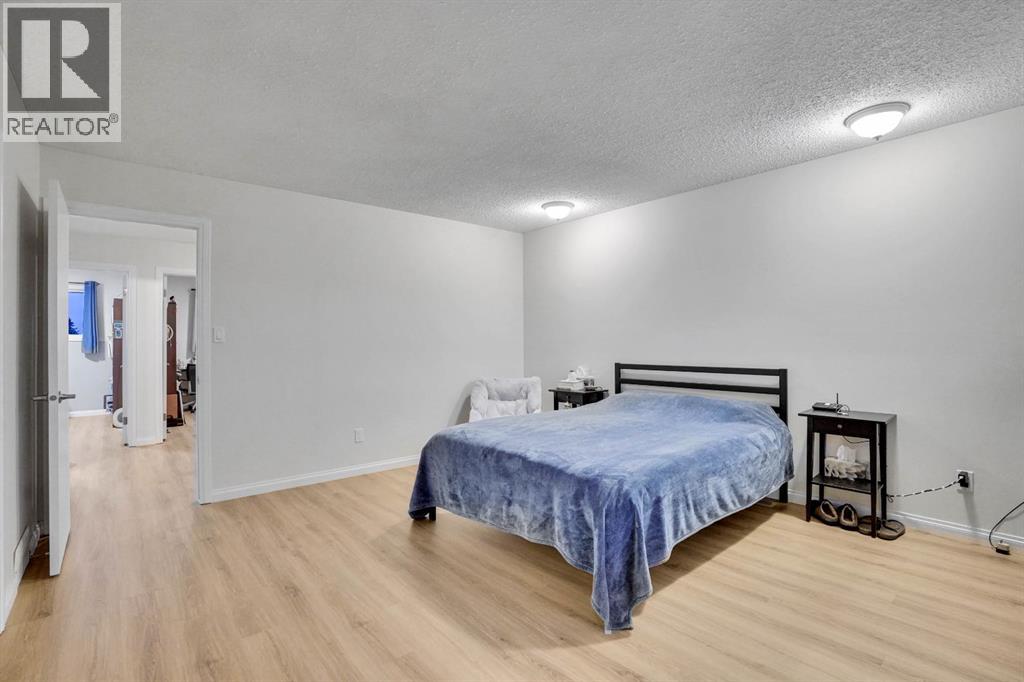 1038 Berkley Drive Nw, Calgary, Alberta  T3K 1A3 - Photo 33 - A2269891