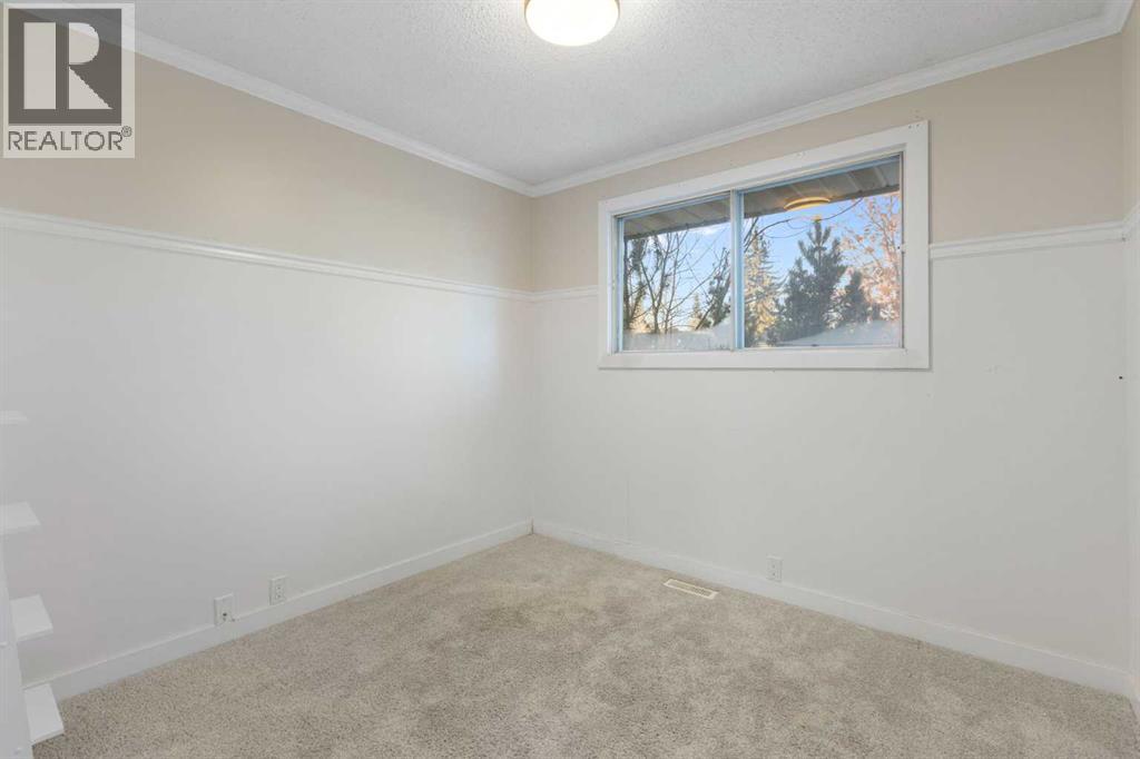 159 Brookgreen Drive Sw, Calgary, Alberta  T2W 2W4 - Photo 18 - A2272184