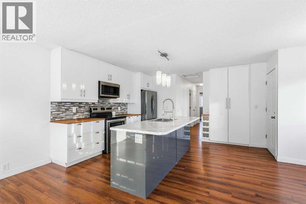 2 Woodfern Road Sw, Calgary, Alberta  T2W 4K9 - Photo 10 - A2273146